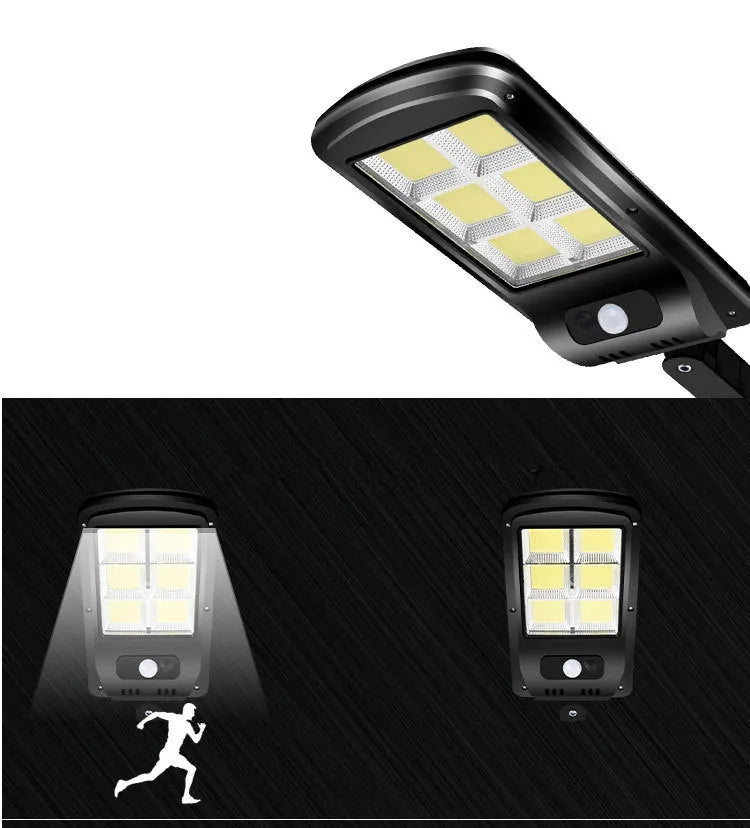 Black outdoor solar-powered motion sensor security light with solar panel on top.