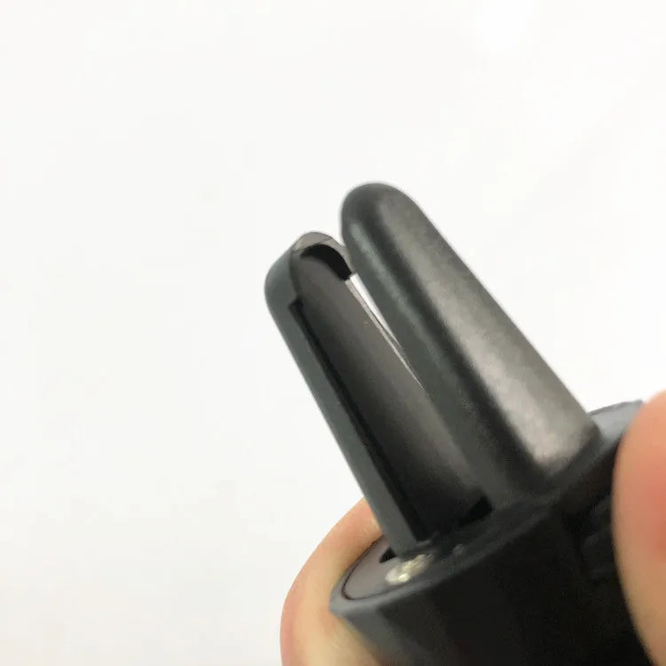 Glory black car phone holder mounted to car air vent with mobile device securely attached