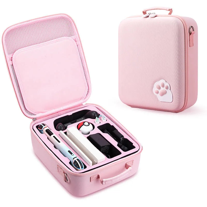Cat claw design Nintendo Switch storage case in pink, open to show compartments for console and 21 game cartridges.