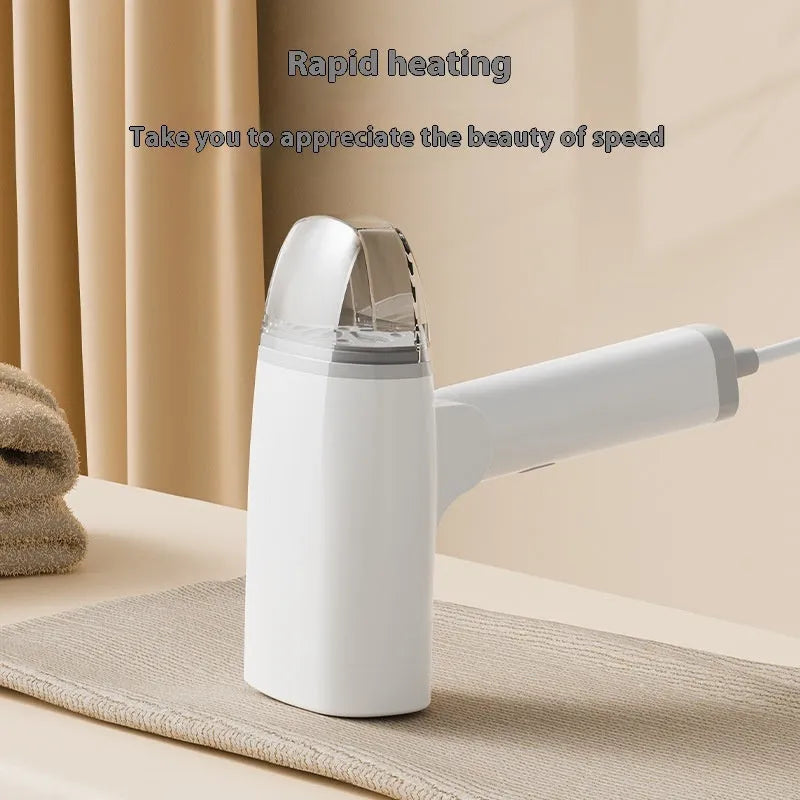 Blue and white handheld garment steamer with compact design and water tank.