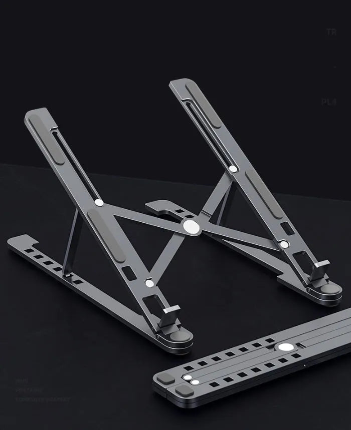 Portable aluminium laptop stand folded showing adjustable height mechanism