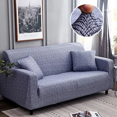Geometric print stretch sofa slipcover on a double seat sofa