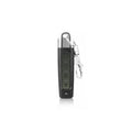Compact black programmable remote control for rolling doors with copy button, shown next to a 12V battery.