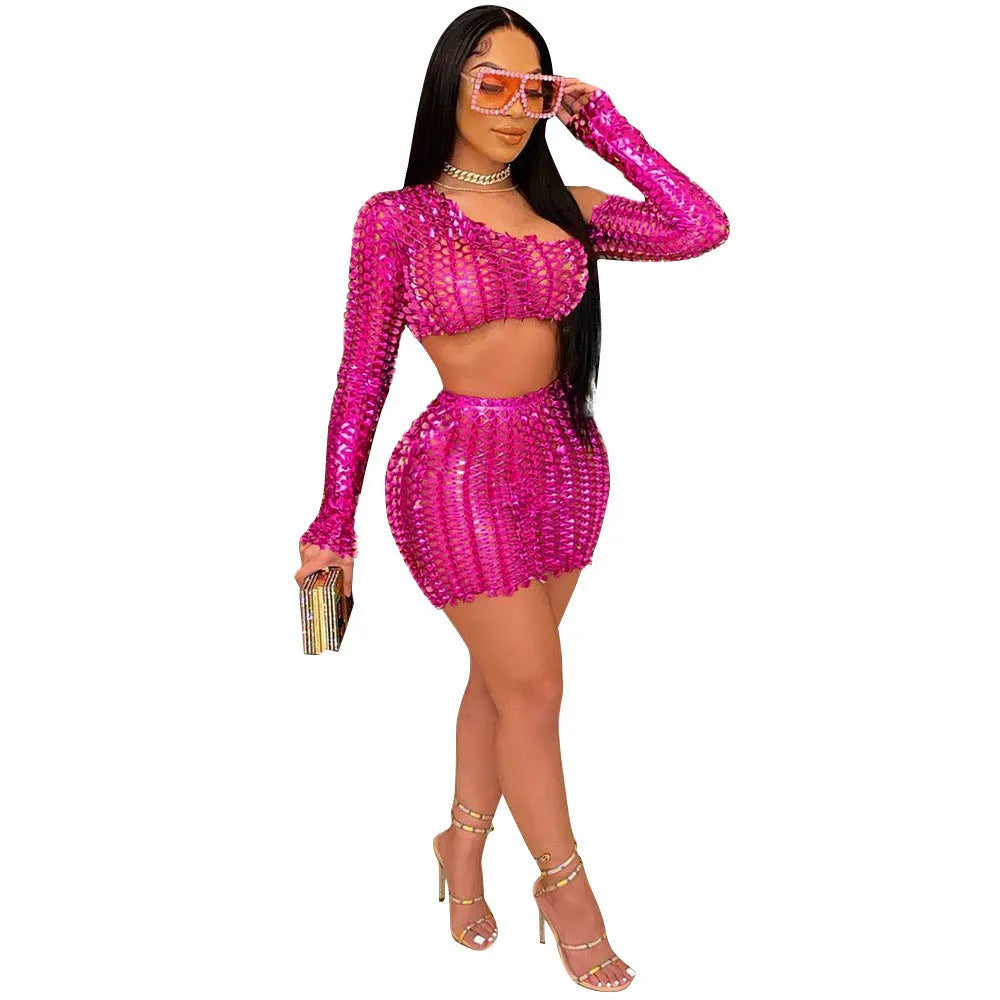 Women's black hollow-out net two-piece dress set with sleeveless top and short skirt.