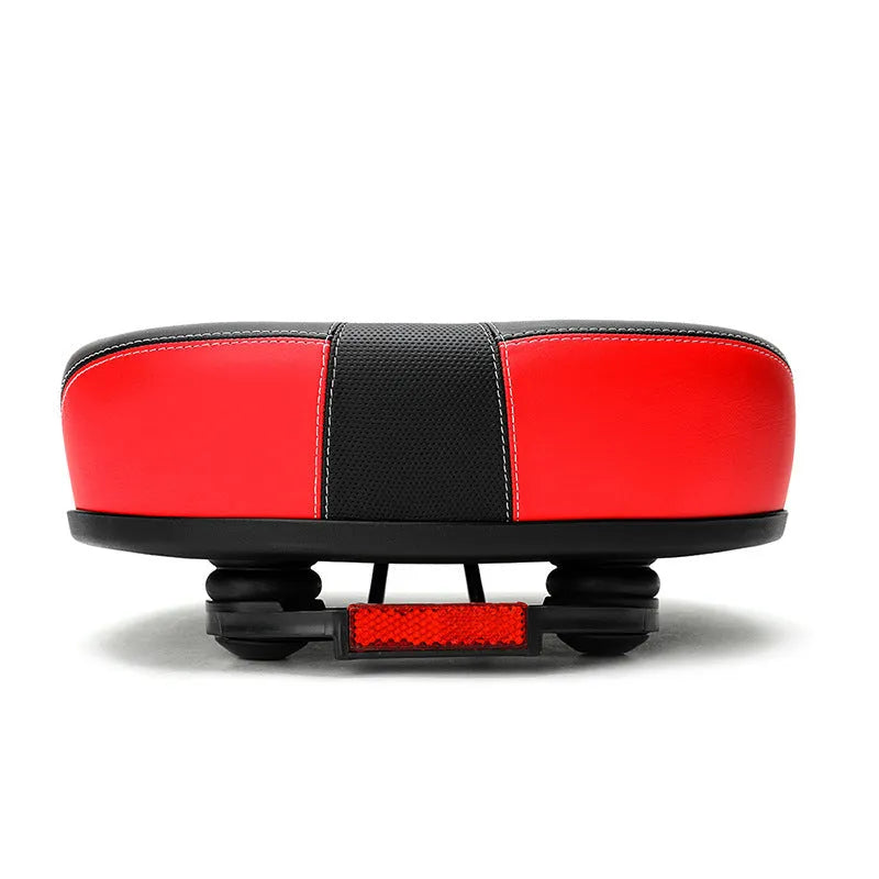 Large red bicycle saddle with reflective stickers and shock absorber for plus-size riders