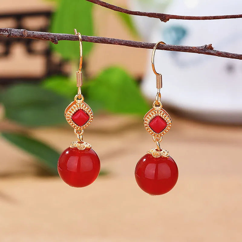 Southern red agate round bead earrings with S925 silver inlaid jasper geometric design on copper alloy