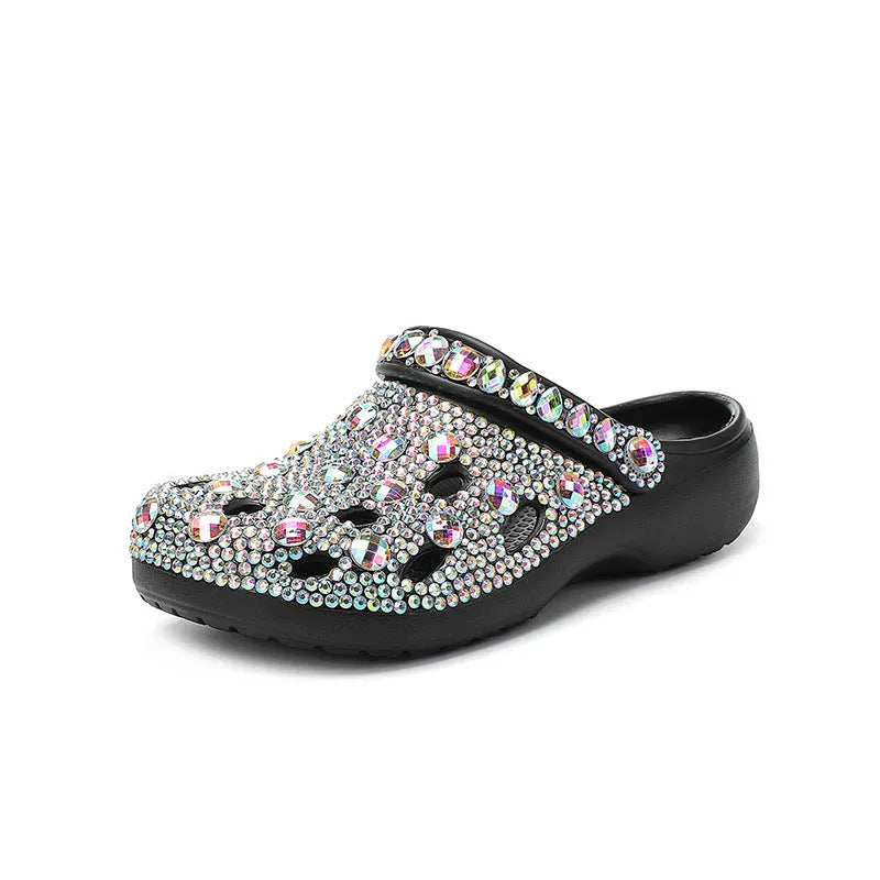 Black platform sandals for women with rhinestone detail on an EVA upper and sole.