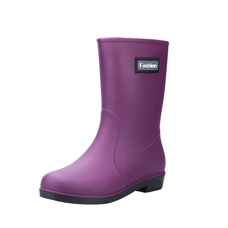 Women's mid-calf rain boot in black PVC with a low heel, shown alongside apricot and brown colour options.