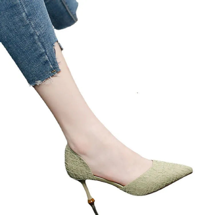 Women's black pointed toe stiletto heels with leather stitching details and 6-8cm heel