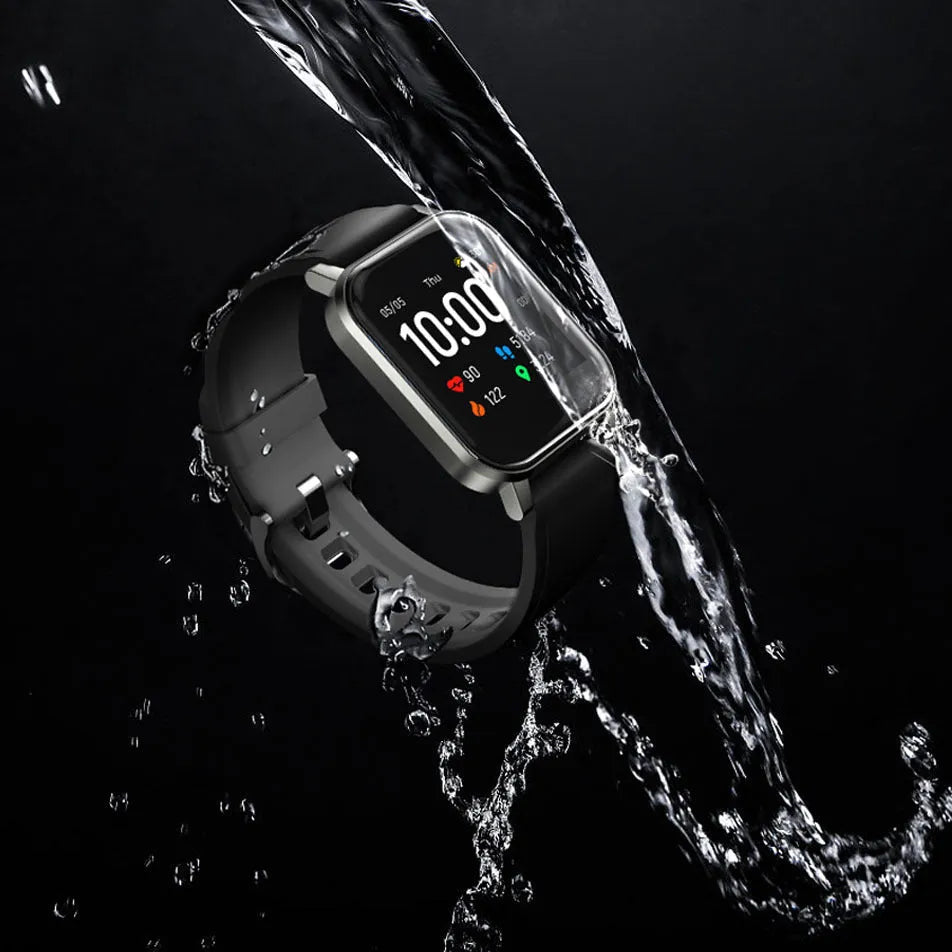 Black waterproof smart fitness bracelet with colour screen on a silicone wrist strap.