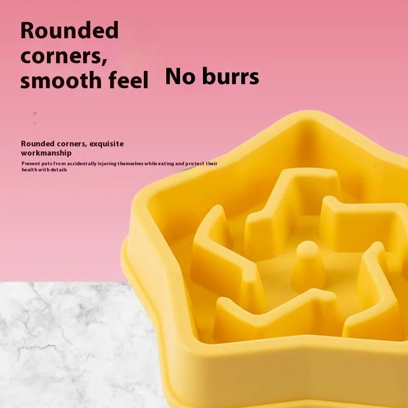 Yellow plastic dog slow feeding bowl with textured bottom surface for choking prevention