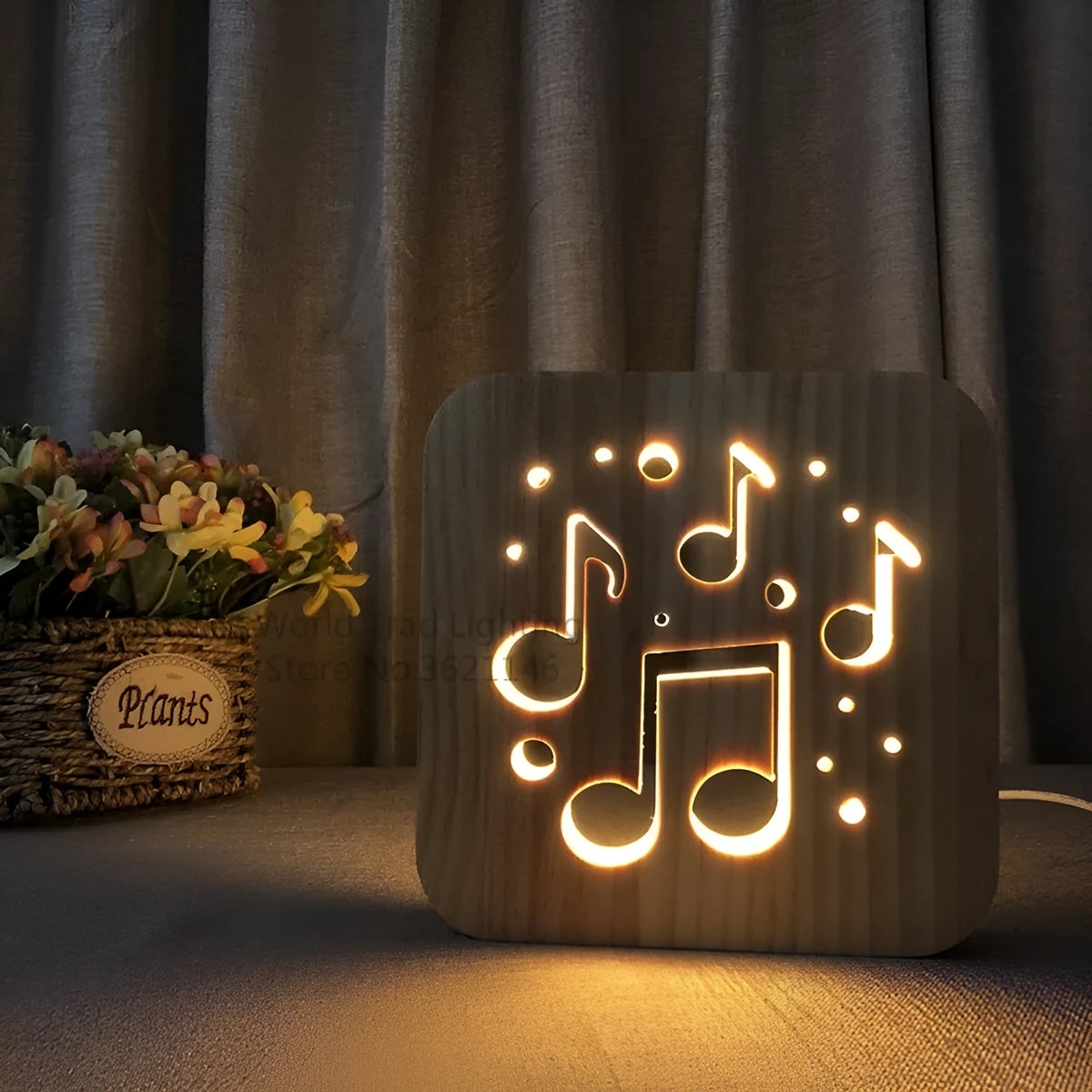 Pine wood cube LED lamp with warm white light, showing USB cable connection