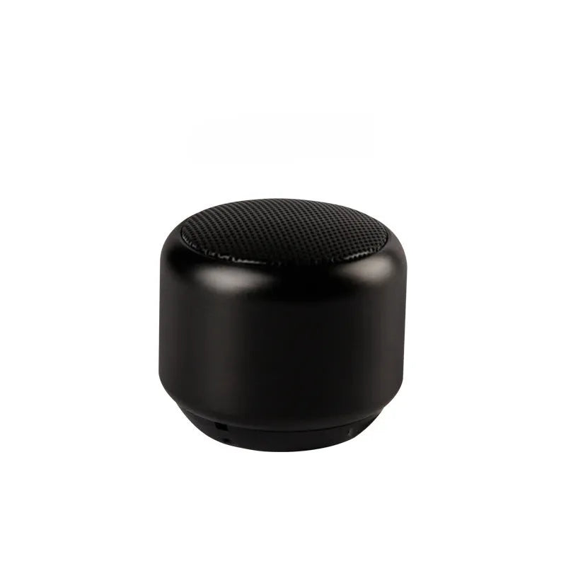 Small portable Bluetooth mini speaker in black, blue, gold, or pink colours showing compact design.