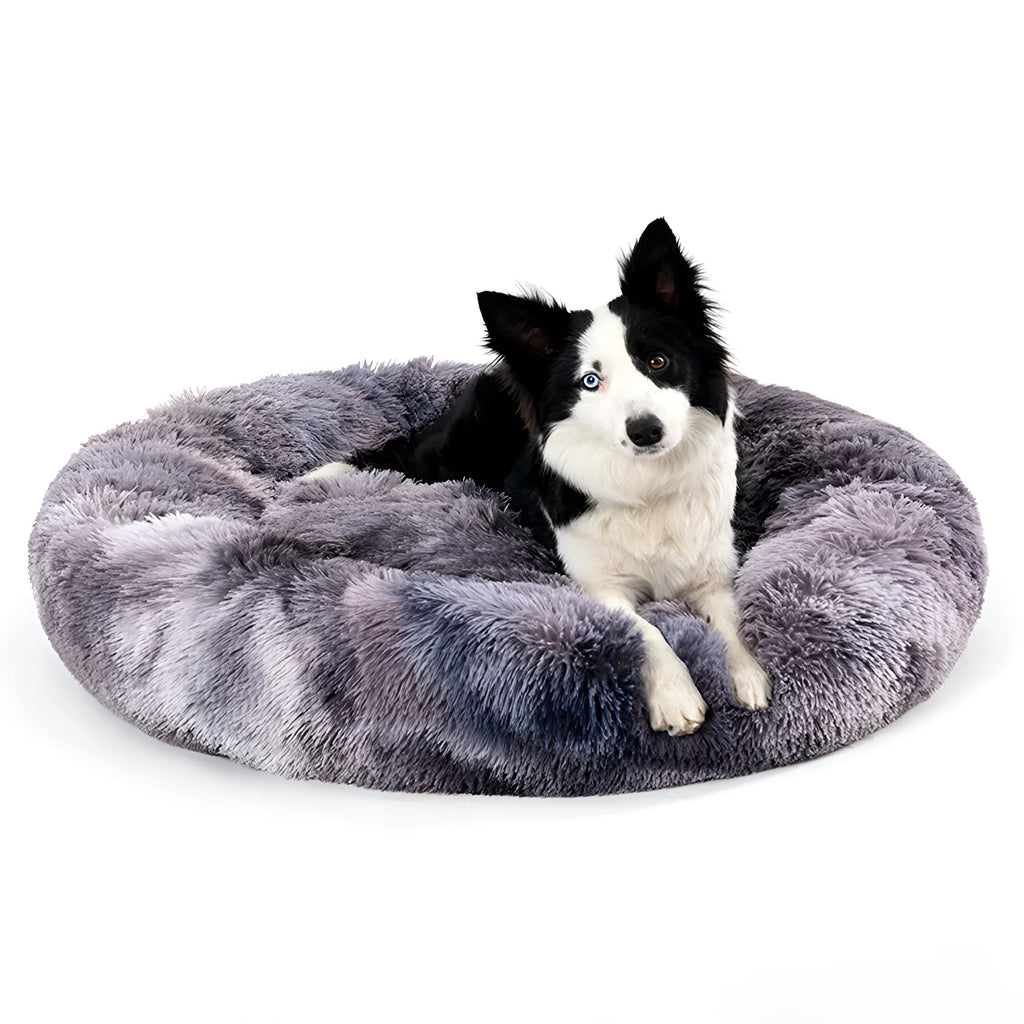 Fluffy donut-shaped dog bed in long plush fabric, showing raised rim and available colour options