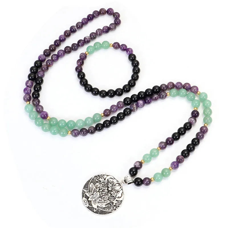 Handmade stone bead yoga necklace with geometric alloy lotus pendant and matching bracelet.