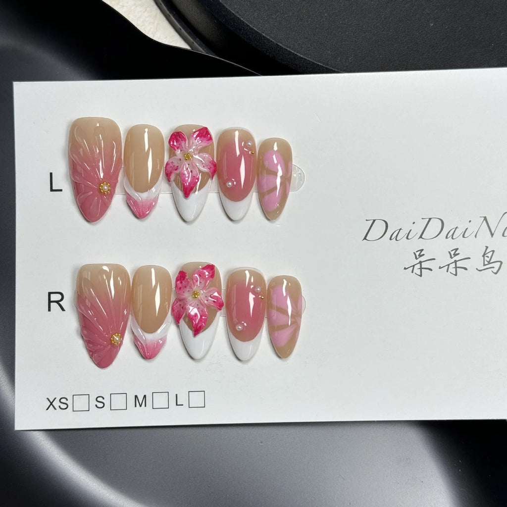 Set of plastic French style lily ice flower almond shaped nail armour capsules in XS, S, M, L sizes.
