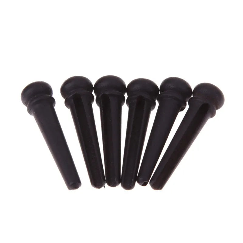 Six ebony folk guitar string nails with matt black finish for acoustic guitar repair