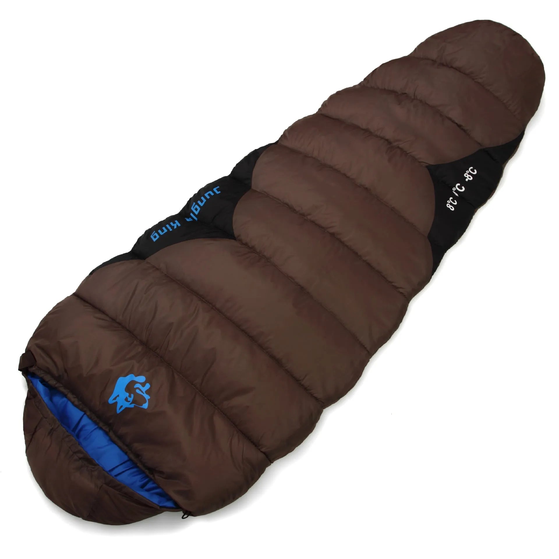 Brown cotton camping sleeping bag partially rolled next to its grey compression storage sack.
