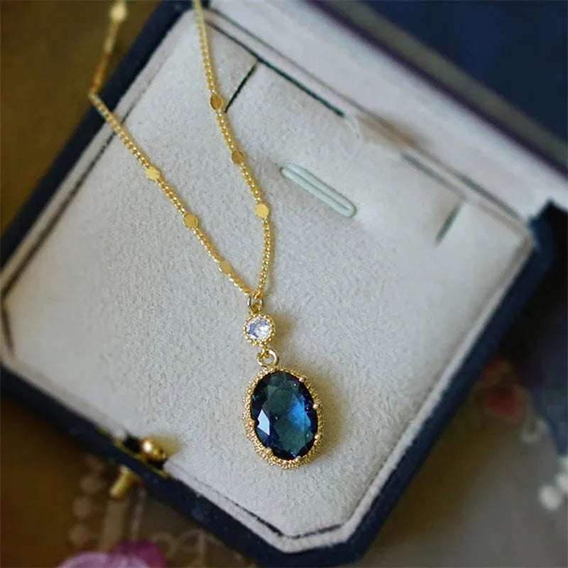 Gold electroplated geometry pendant necklace on adjustable chain with French retro design
