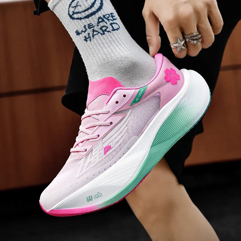 Low-top carbon plate running sneaker in various colours with natural rubber sole and lace-up design.