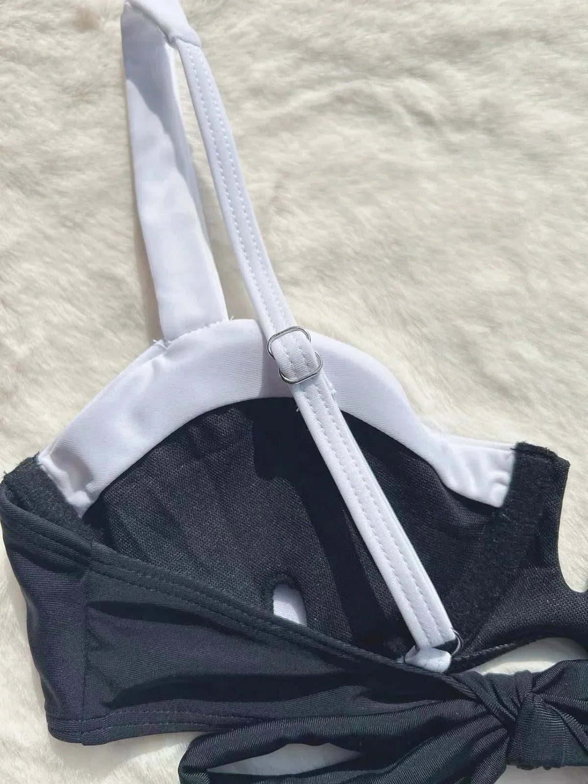 Black women's low waist bikini with stitching split detail, nylon and spandex swimsuit