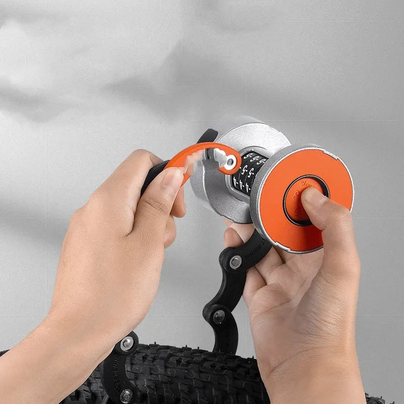Folding bicycle lock in black orange colour showing extended and collapsed positions