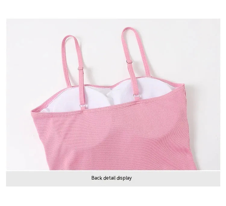 Women's long sleeve one-piece swimsuit in polyester available in pink or black colours