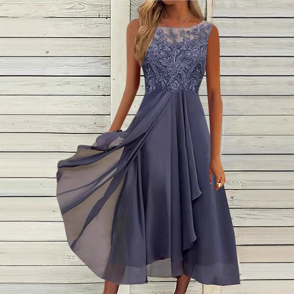 Women's sleeveless chiffon dress with hollow-out lace detail in green, shown on a hanger.