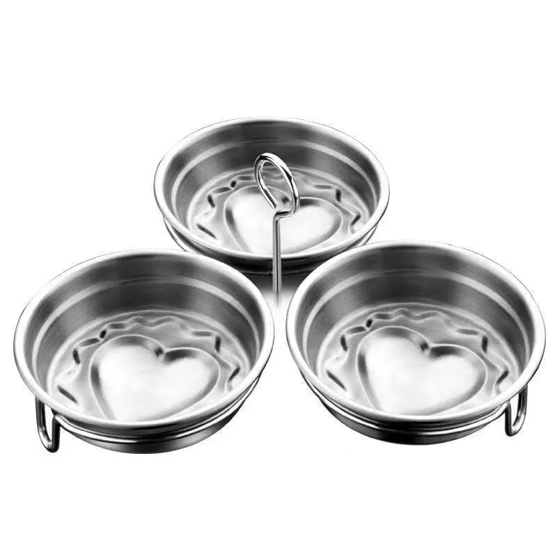 Mini stainless steel heart-shaped and round egg steamer cooker for single eggs.