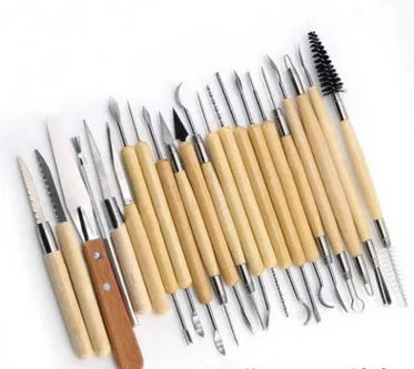 Brown 27-piece pottery clay sculpting tool set with wooden handles and stainless steel ends, includes storage bag.
