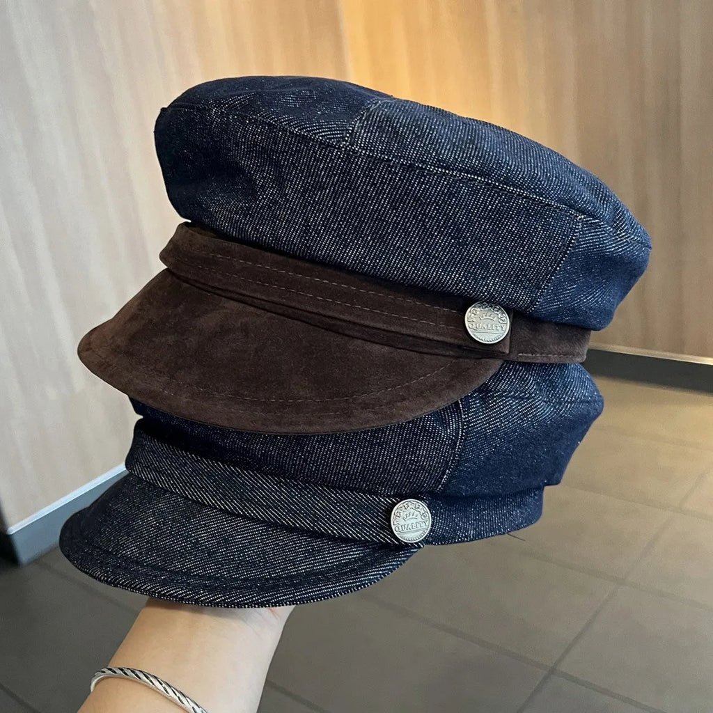 Dark blue denim newsboy hat with adjustable sizing and optional contrasting brim colours