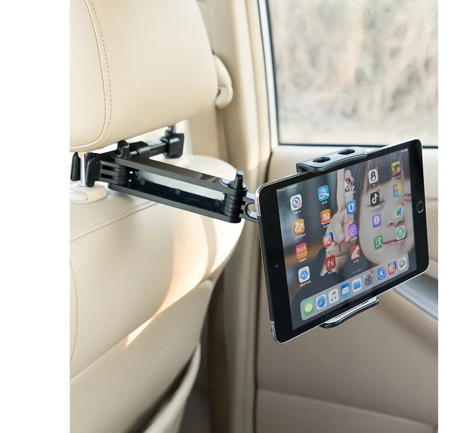 Black universal car phone holder mounted on a rear seat headrest, holding an iPad.