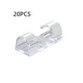 Transparent self-adhesive plastic cable clips in four sizes for wire organisation