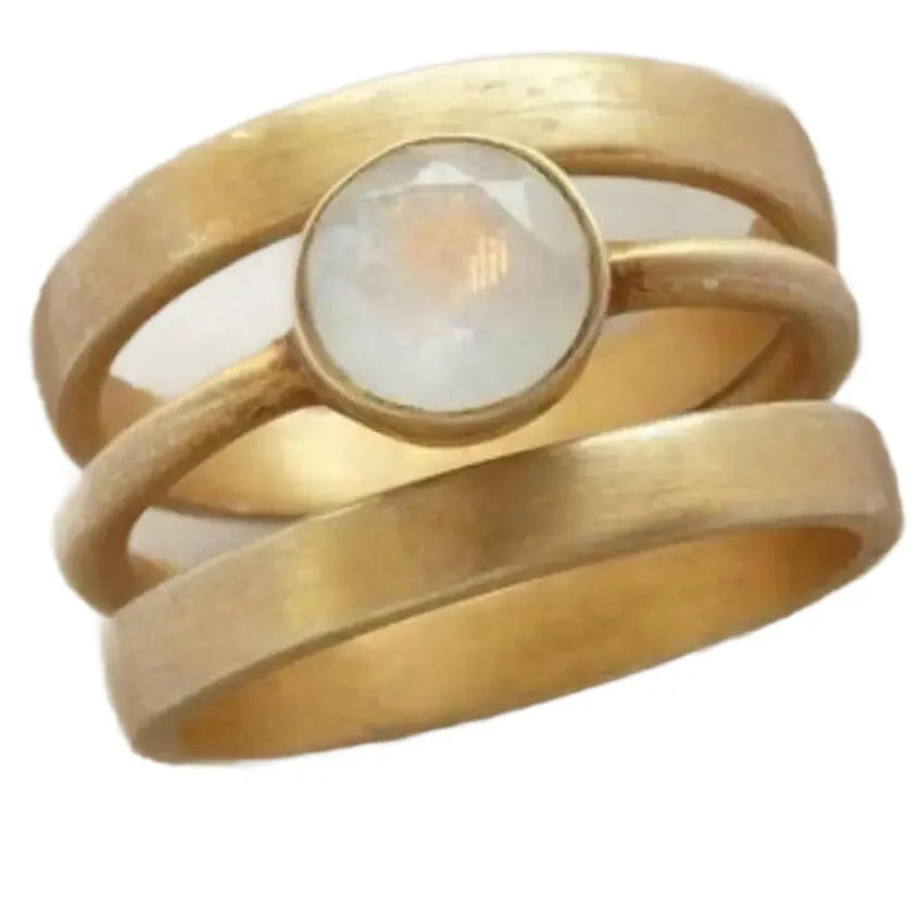 Geometric titanium steel ring with hollow micro-inlaid white chalcedony stones and gold electroplated finish