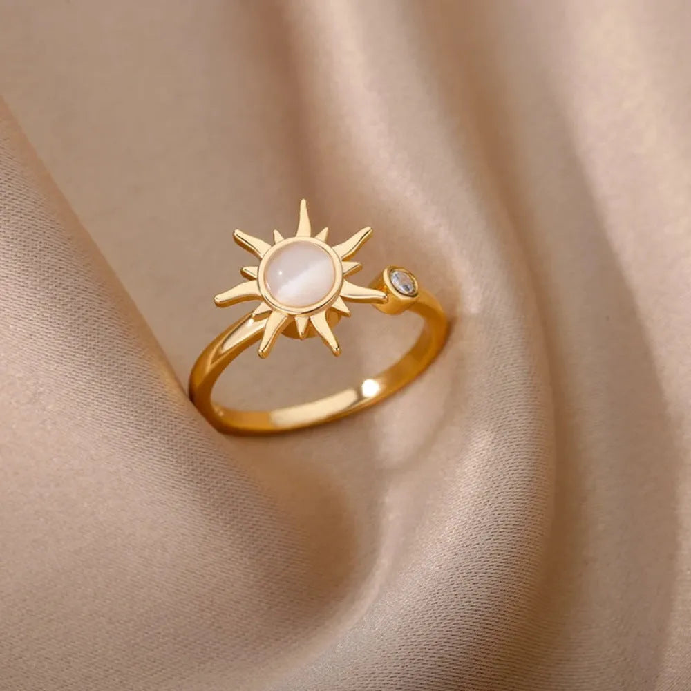 Gold and platinum electroplated copper rotatable ring with adjustable open mouth and geometric round shape
