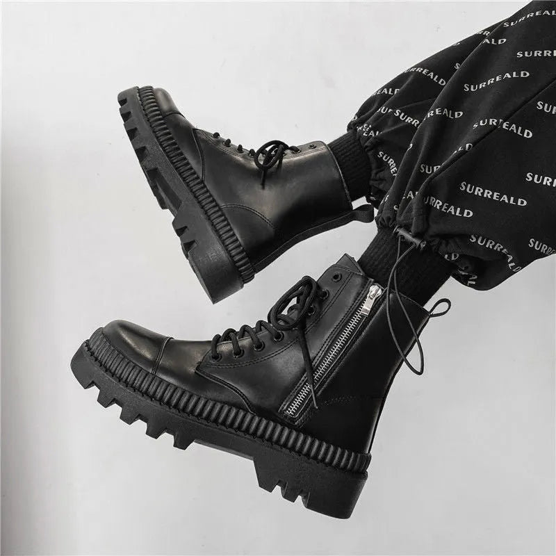 Men's black frosted leather Doc Martens platform boots with a side zip and high-top design.