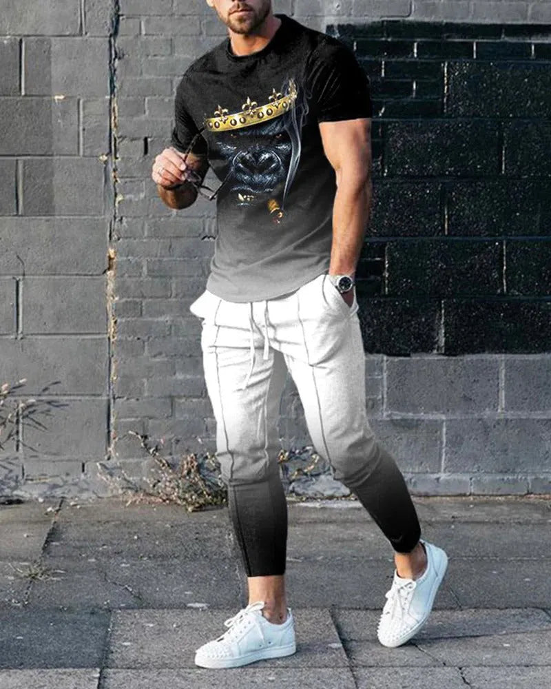 Men's short-sleeved printed sport suit set showing t-shirt and trousers in polyester blend fabric
