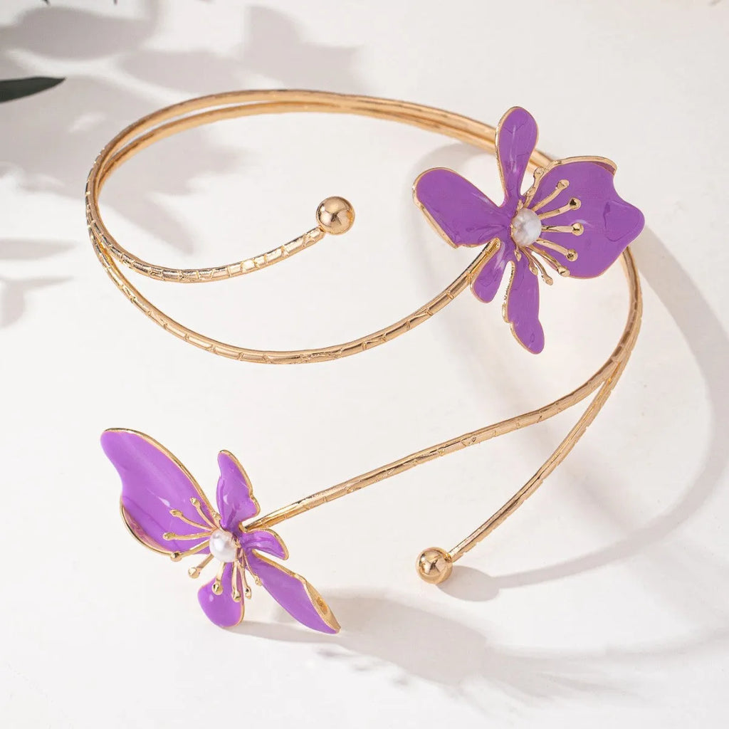 Pink and purple alloy armband bracelet with hollow patterned designs and detailed lines