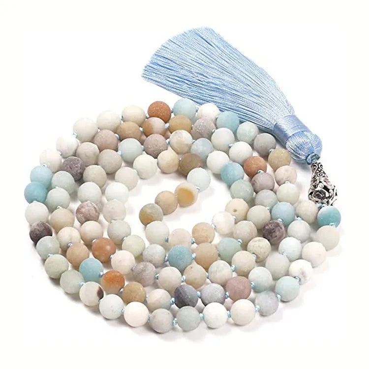 Long multi-stone agate and amethyst tassel necklace with blue pattern, geometric beads.