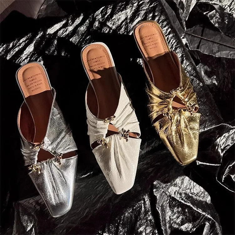 Women's genuine leather half toe cap slippers in gold colour with a low heel and square toe.