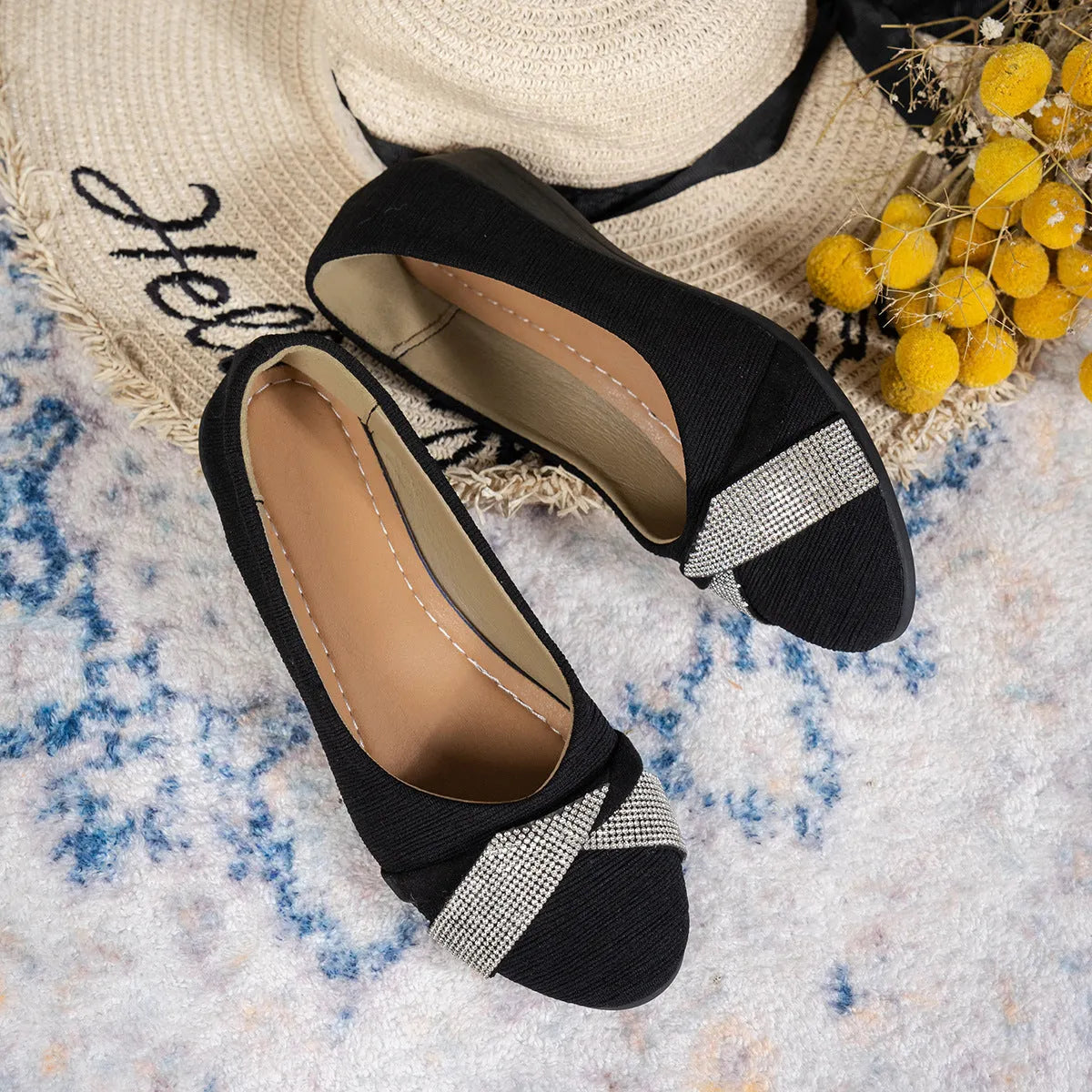 Women's black casual slip-on shoes with rhinestone details on fabric upper and chunky heel