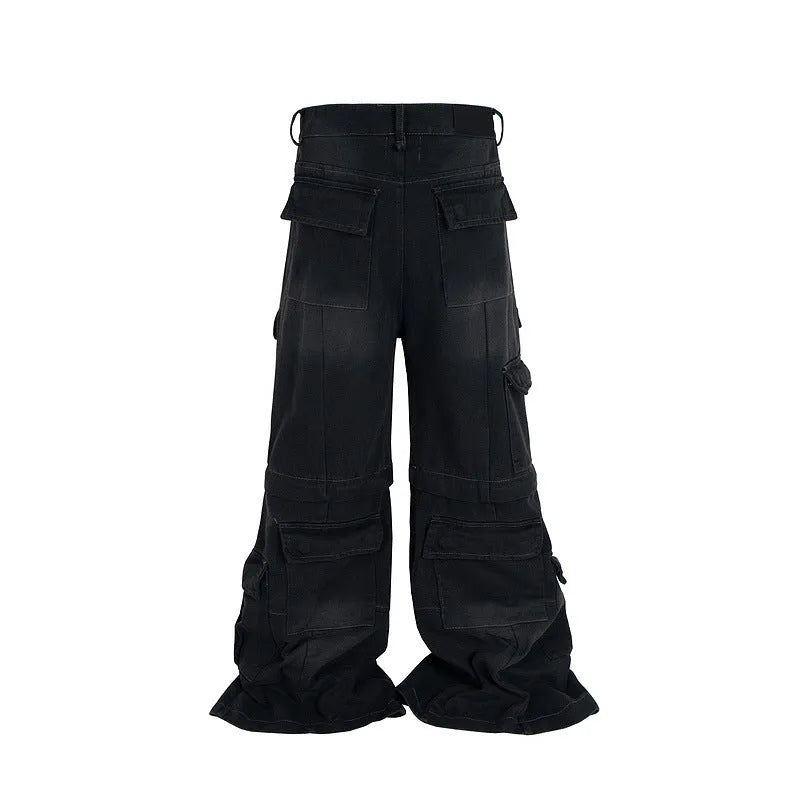 Black cotton overalls with detachable multi-pocket design and two-way zip.
