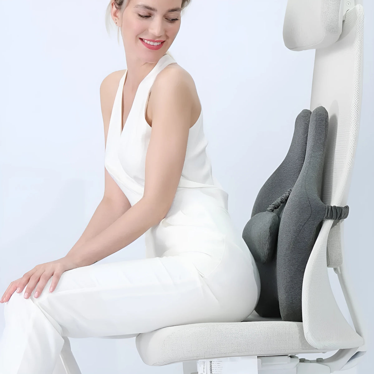 Memory foam car lumbar cushion in black colour showing 50cm width