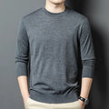 Men's round neck long sleeve wool blend pullover sweater in caramel colour on a hanger.