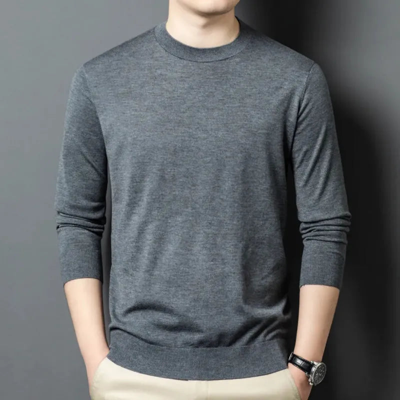 Men's round neck long sleeve wool blend pullover sweater in caramel colour on a hanger.