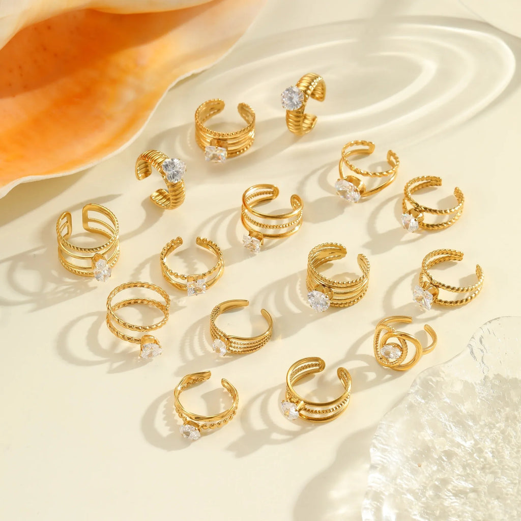 Gold electroplated stainless steel ring with zircon geometric design on adjustable open mouth band