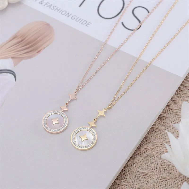 Women's titanium steel necklace with six-pointed star pendant on O-ring chain in gold finish