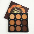 Dark matte 9-colour waterproof makeup palette compact open showing colour pans