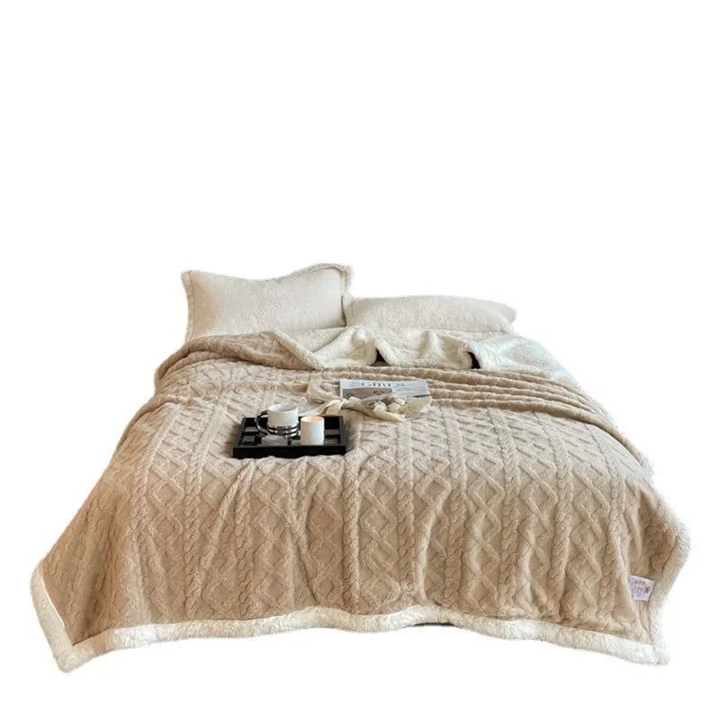 Thick taffeta thermal flannel winter blanket on a bed in tea green colour