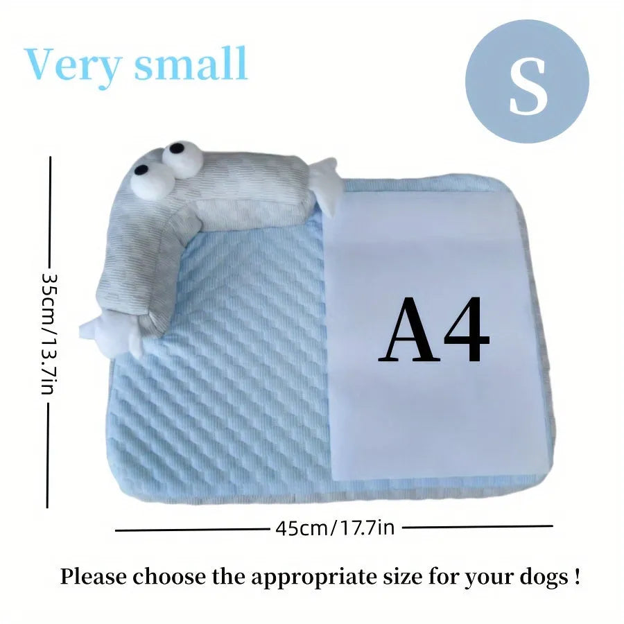 Blue and yellow pet bed cushion with big-eyed monster design on a non-slip base for dogs and cats.